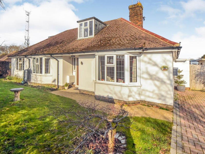 Attractive four bedroom detached double fronted chalet bungalow.
