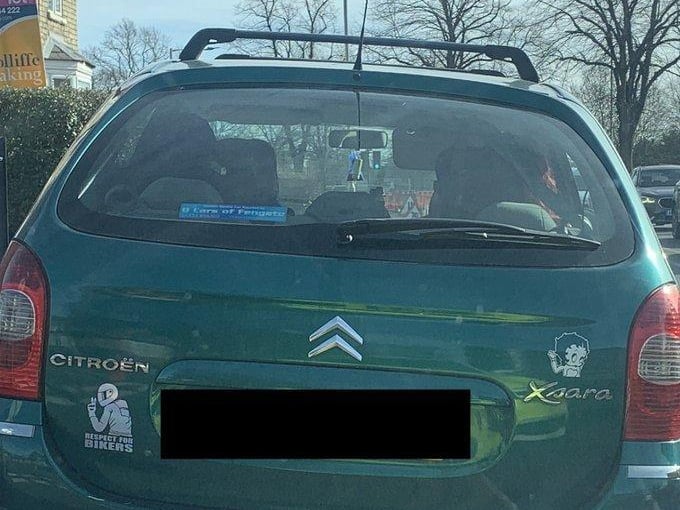 Stopped due to no seatbelts being worn while there discrepancies with the insurance policy taken out the day before