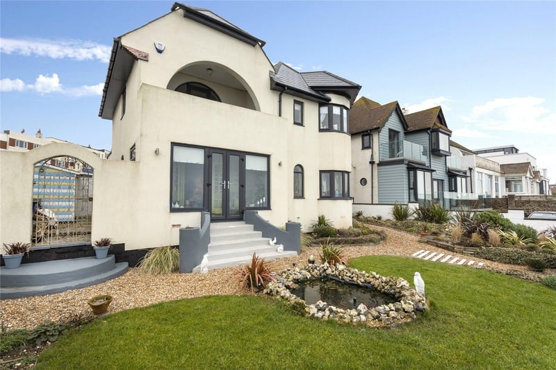 A modern home with panoramic views of the sea. Price: £800,000.