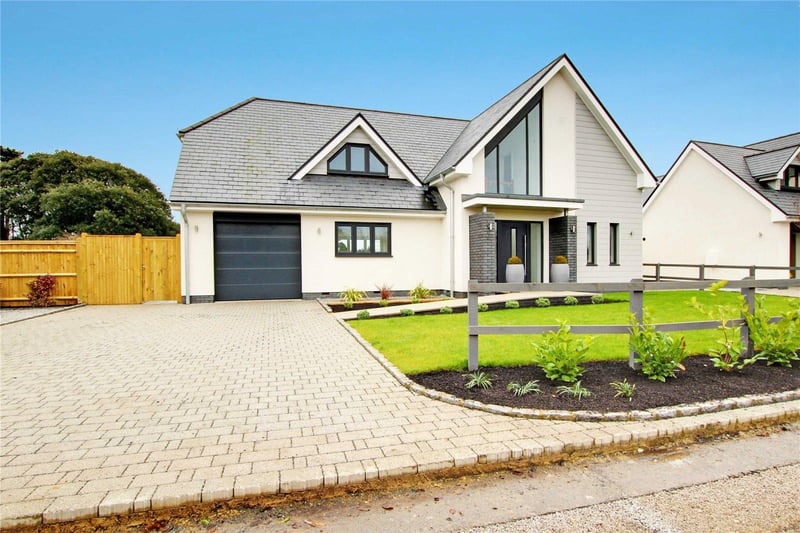 A stunning and individual brand-new contemporary home backing on to Ferring Cricket Ground. Price: £1,200,000.