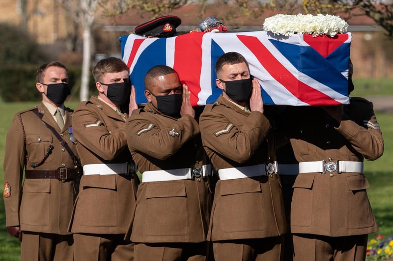 The coffin of Captain Sir Tom Moore is carried by members of the Armed Forces during his funeral at Bedford Crematorium on Saturday (February 27). (Photo by Joe Giddens - Pool/Getty Images)