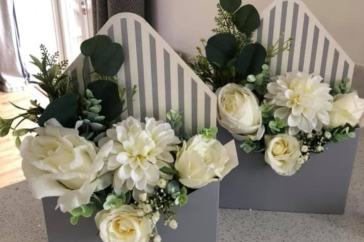 These stunning artificial flower envelopes were made by 'Blossom Meadow'. Clare also makes hatboxes, frames, pretty hanging ceramics and more! For more information, visit her Facebook page.