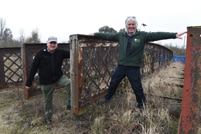 Brian Pearce (right) at Railworld with volunteer John Crane (left) and the bridge they want to connect to Habitat Island.