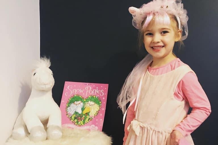 Neevie, aged 4, is dressed up as one of the ponies from her favourite book ‘Snow Ponies’.