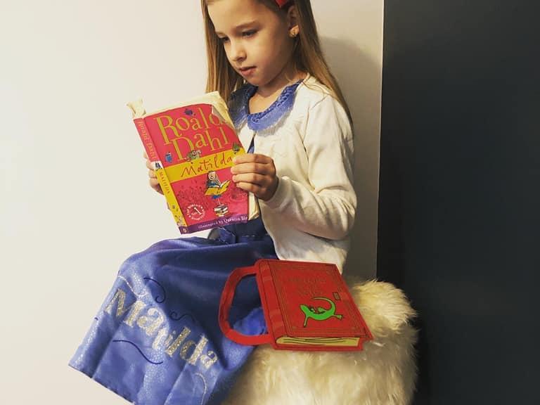 Esme, aged 7, has made so much effort dressing up today as Roald Dahl's Matilda.