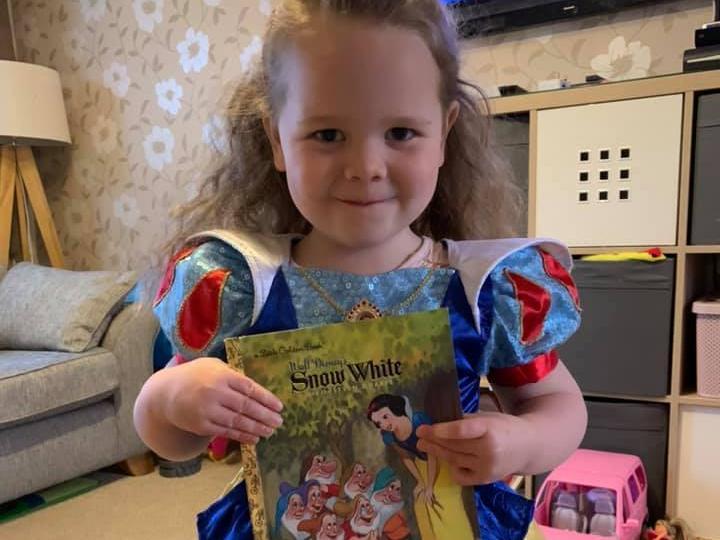 Mia, aged 3, has gone to nursery today dresses up as princess, Snow White.