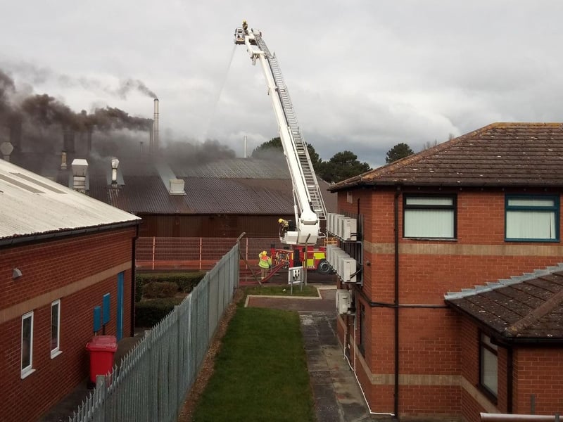 Firefighters on the scene of the blaze in Heckington Business Park. Photo: Andrew Bradley EMN-210403-140713001
