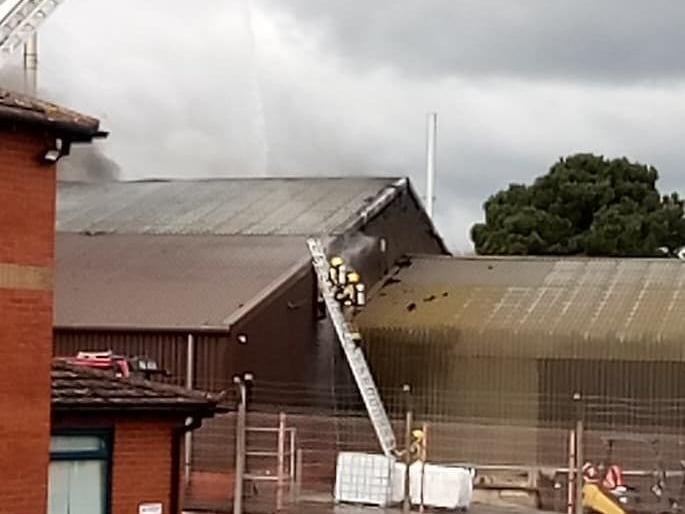 Firefighters on the scene of the blaze in Heckington Business Park. Photo: Andrew Bradley EMN-210403-140601001