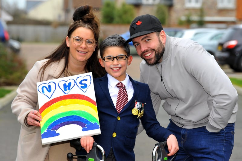Vinnie, 8, completed 100 laps of his home estate, accompanied by his proud parents, in honour of his hero Captain Sir Tom Moore