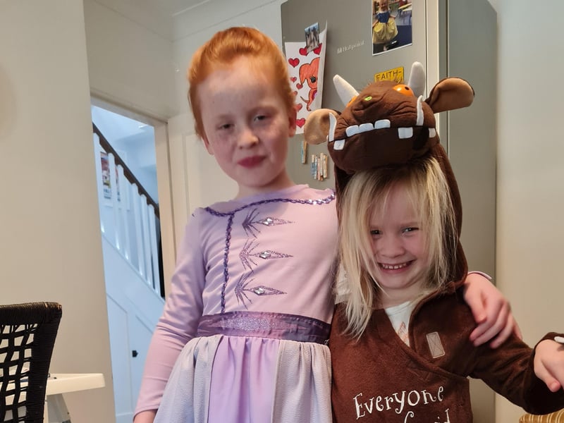 Bryony Campbell, aged 7, as Elsa and Faith Campbell, aged 4, both from Bexhill, as The Gruffalo SUS-210503-092325001