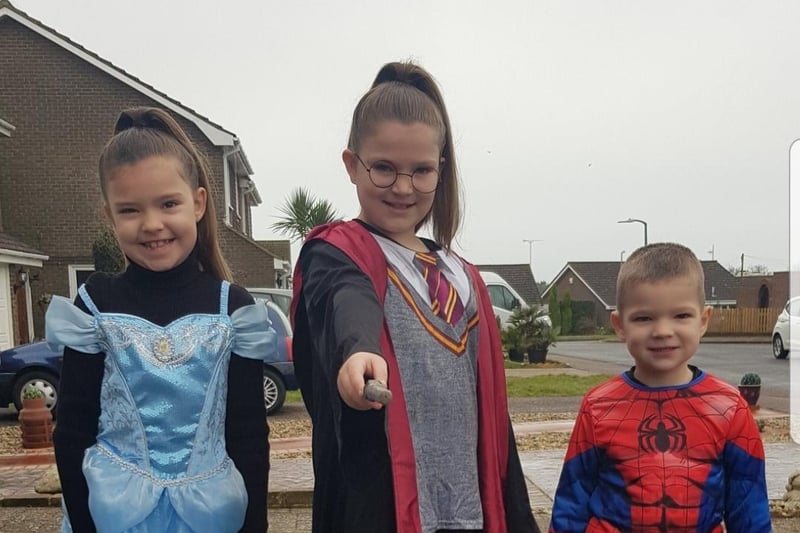 Demi Hewgill 9 as  Harry Potter, Brooke Hewgill, 7, as  Cinderella  and Theo Hewgil,l 4, as Spider man SUS-210503-104331001