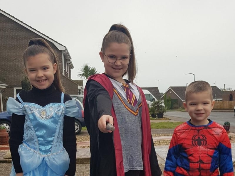 Demi Hewgill 9 as Harry Potter, Brooke Hewgill, 7, as Cinderella and Theo Hewgil,l 4, as Spider man SUS-210503-104331001