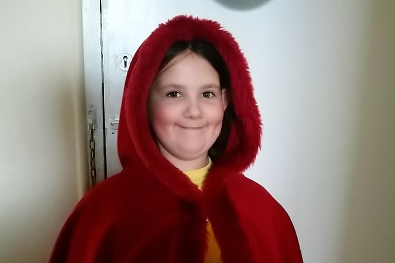 Claudia Seller, aged 9, as Little Red Riding Hood SUS-210503-105419001