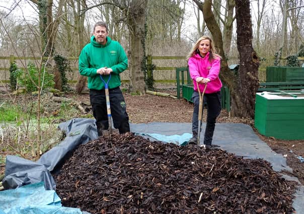 The founders of Up The Garden Bath with donated woodchip from Nene Park Trust. EMN-210503-150933001