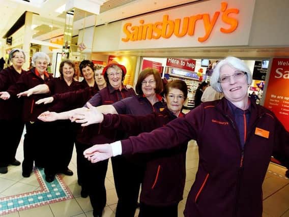 Sainsbury'; s (Grosvenor centre) re-opens after a 12 day refit. Long serving staff members help with the opening of the store....Names & Service front-back: Valetta Maycock (40), Kay Isles (39), Janice Cave (38), Margaret Stonton (31), Mary Kiely (31), Chris Grant (30), Helen Ludlow (30), Heather Simmons (29), Linda Gibbons (28)