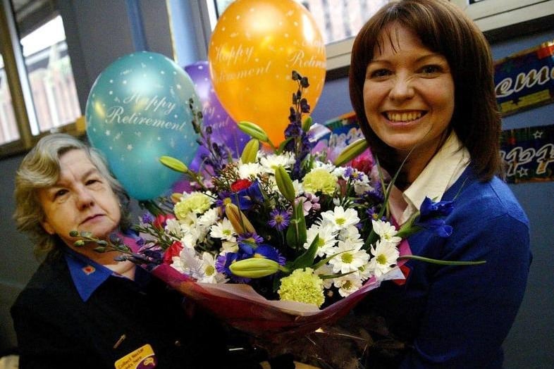 Beverley Hughes retires from Sainsburys in teh grosvenor centre after 37 years, photographed with manager Nicki Richardson