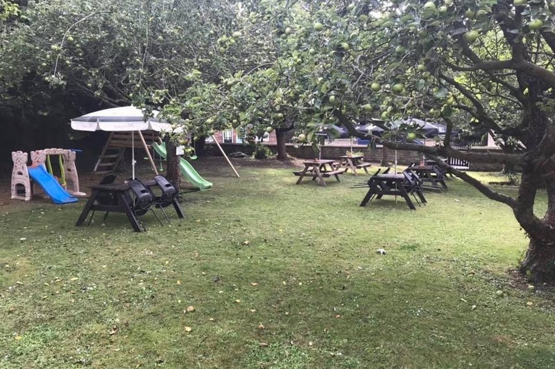 The orchard beer garden at The George Hotel, Leadenham. EMN-210603-140102001