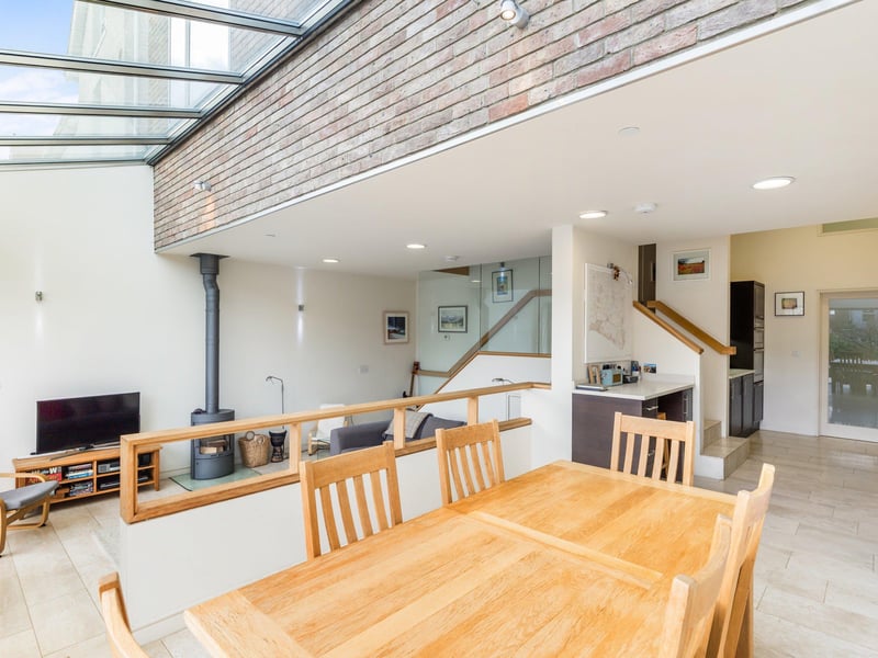 Limestone flooring carries on through to the dining area with ample space for table and chairs.