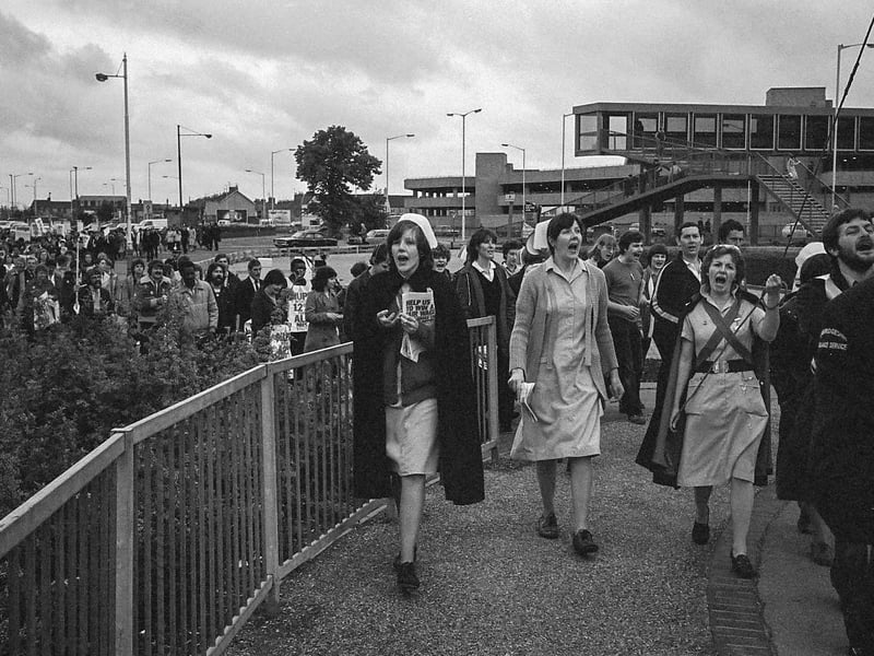 Health workers marching through Peterborough in a protest over pay.