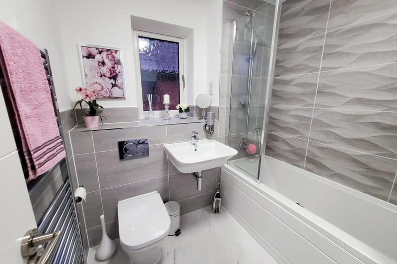 An attractive family bathroom with three piece suite in white.