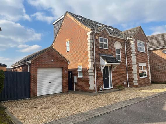 A stunning four double bedroom detached property is situated in a select close of similar homes.