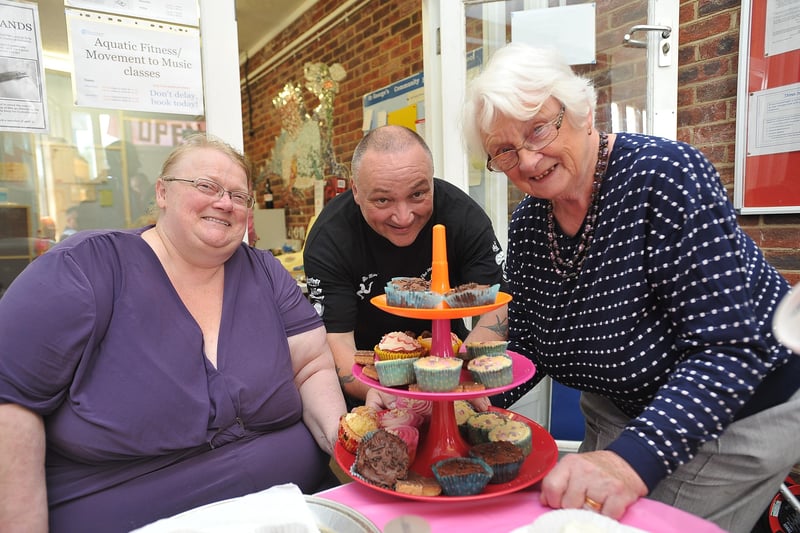Marion Hayes, Gary Owen and June Worley selling cakes at an open day in 2014 EMN-140830-203703009