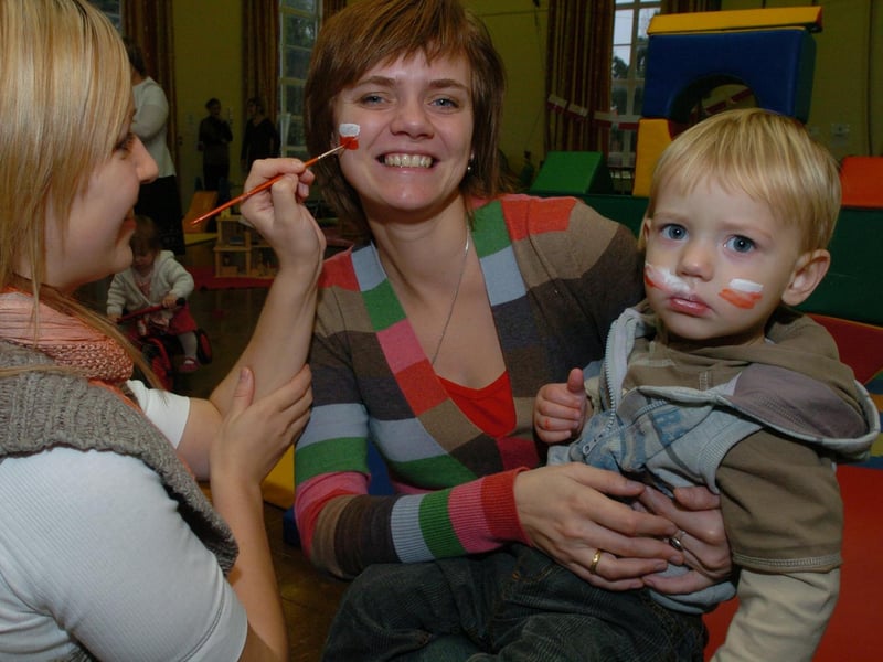 Wellingborough Croyland Nursery: Anna Grucela gets her face painted with son Olwier, 17 months. November 2008