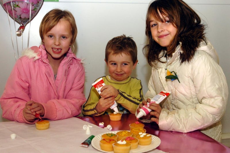 Lauren Leslie, 7  William Way, 4 and Jenny Ludford, 7 ice cakes for their mums in Asda Rushden. March 2008.