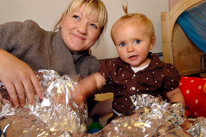 Mum Gemma Finnegan with her daughter Chloe, 11 months, in Corby Kingswood Children's Centre. April 2008