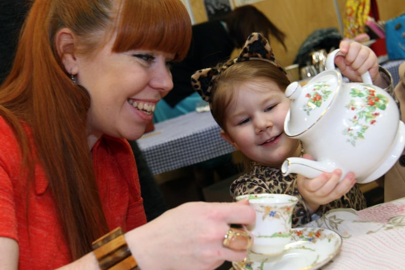 Corby, Lodge Park Sports Centre afternoon tea event: Sofia Siller, 3, pours tea for Zoe Jefferson 2013