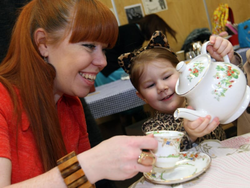 Corby, Lodge Park Sports Centre afternoon tea event: Sofia Siller, 3, pours tea for Zoe Jefferson 2013