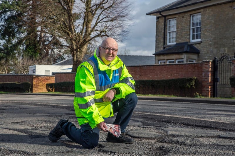 Mark in Silverstone Village where there are many potholes on the main road