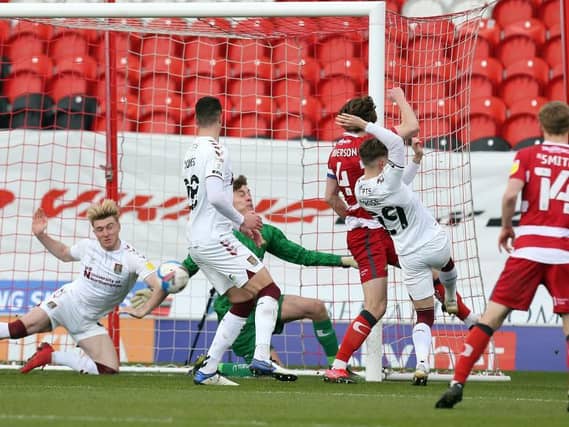 Wrong place, wrong time! Ryan Watson inadvertently prevents his own team from scoring. Pictures: Pete Norton.