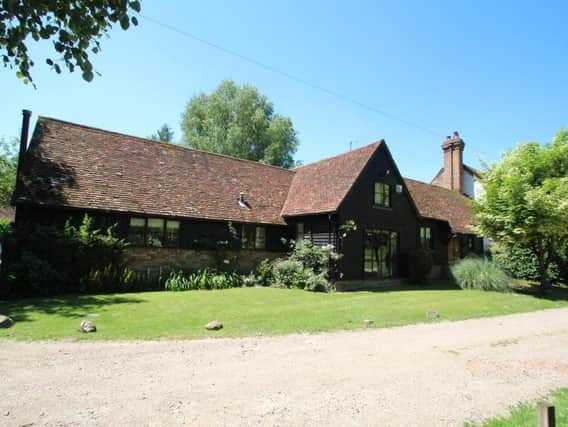 This four-bedroom barn conversion in Hemel Hempstead is on the market right now. Photos: Rightmove and Brown & Merry, Country House & Farm Sales