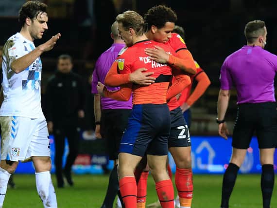 Kiernan Dewsbury-Hall and Sam Nombe celebrate Luton's 2-0 win over Coventry