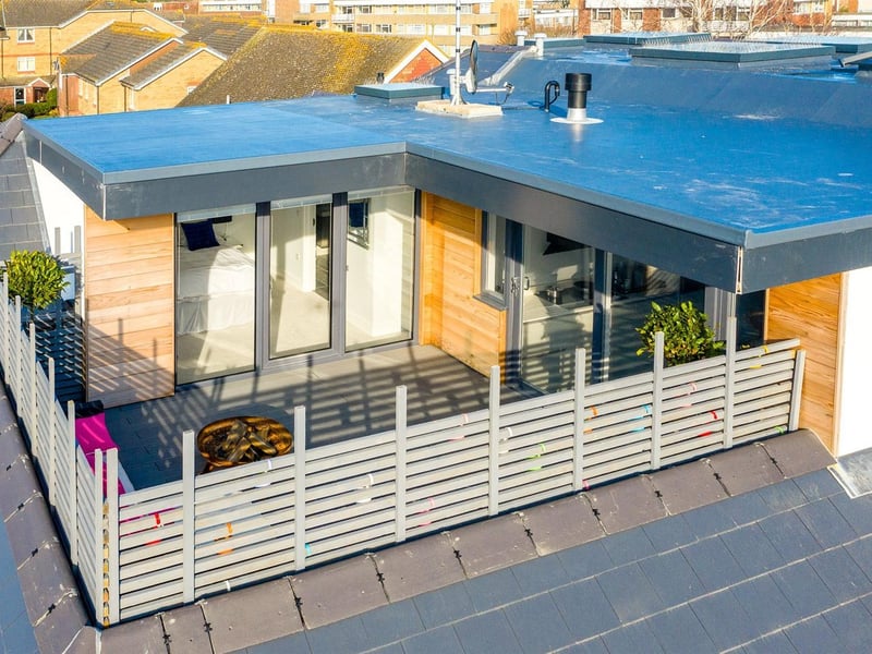 A stunning, brand new, bespoke new build penthouse. Duplex penthouse apartment with imposing double height reception space, 15' x 13' south/westerly facing roof terrace and superb open plan living/dining/kitchen area. Priced at £600,000 and sold through Michael Jones Estate Agents.
