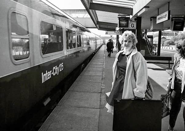 Do you know this woman with her art folder at Peterborough station?