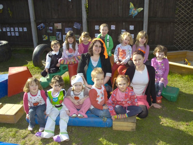 Little Acorns Day Nursery, Boston. Pictured alongside the children are Rachael Stones, nursery nurse, and Tanya Goodyear, (right) nursery assistant.