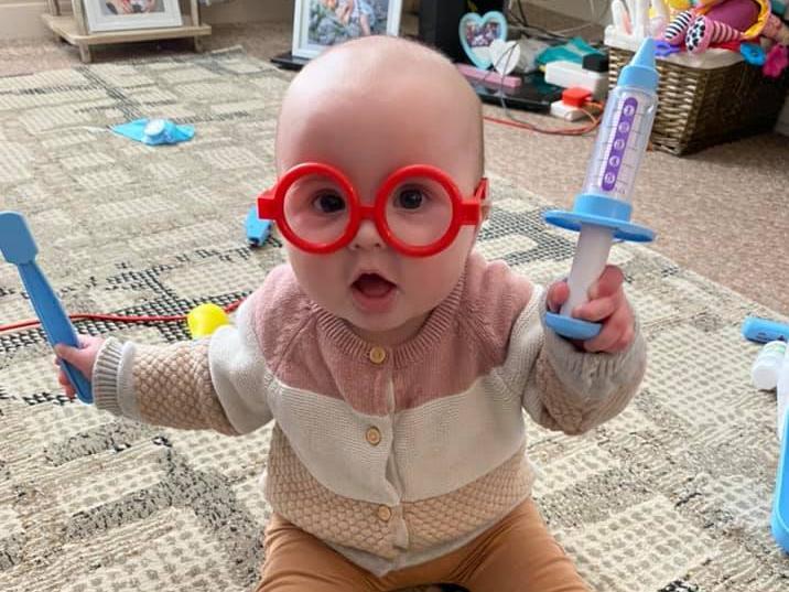 Six-month-old Primrose rolling out the Covid vaccine!