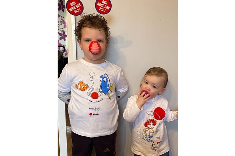 Sisters Charlotte and Sophie Pocock, aged 4 and 1, dress for Red Nose Day in Banbury