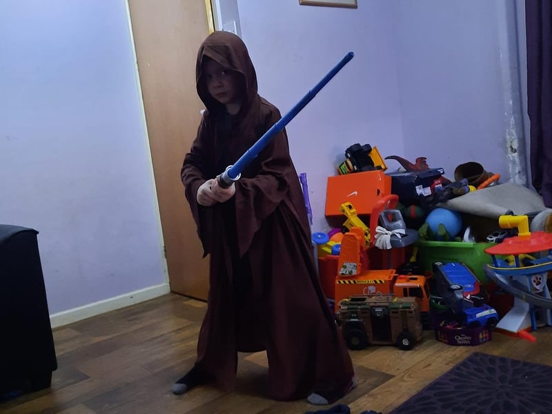 May the force be with you! Aiden, 7, dressed as Obi Wan Kenobi.