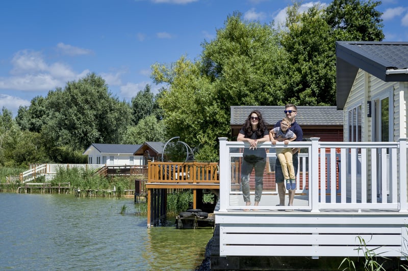 This holiday park has a picturesque setting with a fishing lake.