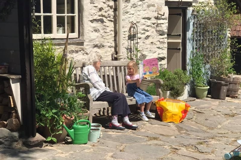 We love this picture. Kat Lucas sent it in last year with the caption: "Learning to read through homeschooling and reading to your great nanny from opposite sides of a bench."