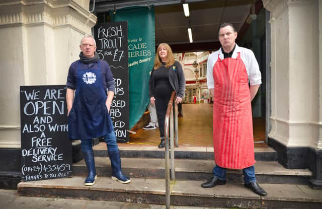 L-R: Paul Saxby (Arcade Fisheries), Pat Horwill (Gifts and Giggles) and Gary Fellows (Arcade Butchers) pictured at the York Gardens entrance to Queens Arcade, Hastings. SUS-210323-110610001