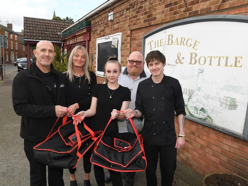 The Barge and Bottle in Sleaford began takeaway food deliveries. L-R Mick Wells, Donna Wells, Megan Maples, Lee Clarke, Joe McDonald. EMN-210323-114001001