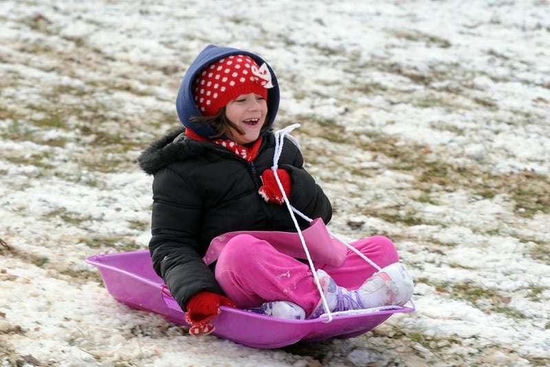 All smiles in the snow at Tilgate Park