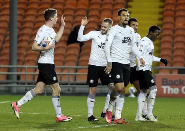 Posh players celebrate their goal against Blackpool. Photo: Joe Dent/theposh.com.