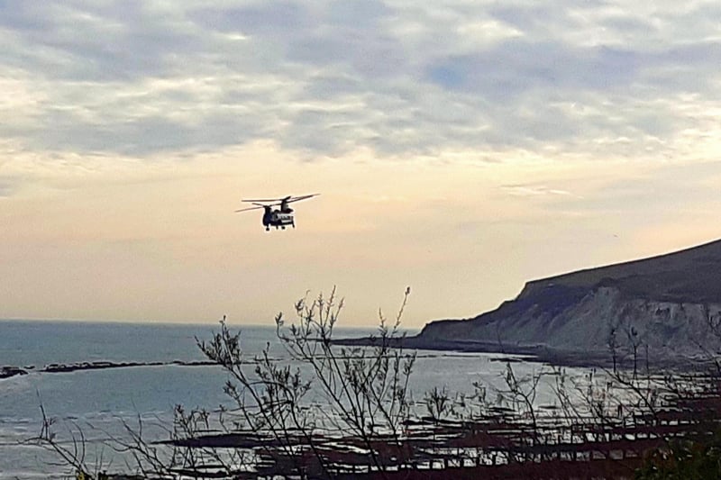 Charley Woods snapped a Chinook helicopter flying over Eastbourne seafront. SUS-210324-101443001