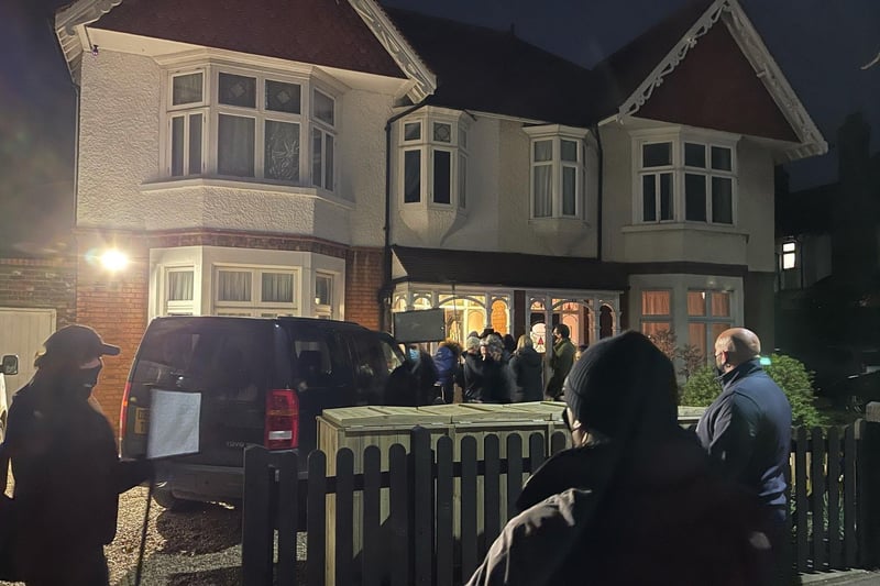 Presenter Fleur East and a TV crew surprise a family in Peterborough watched by some of the neighbours.