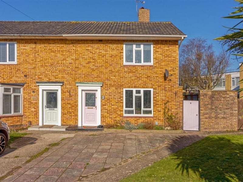 A two bedroom end-of-terrace house with a large rear garden. Price: £290,000.
